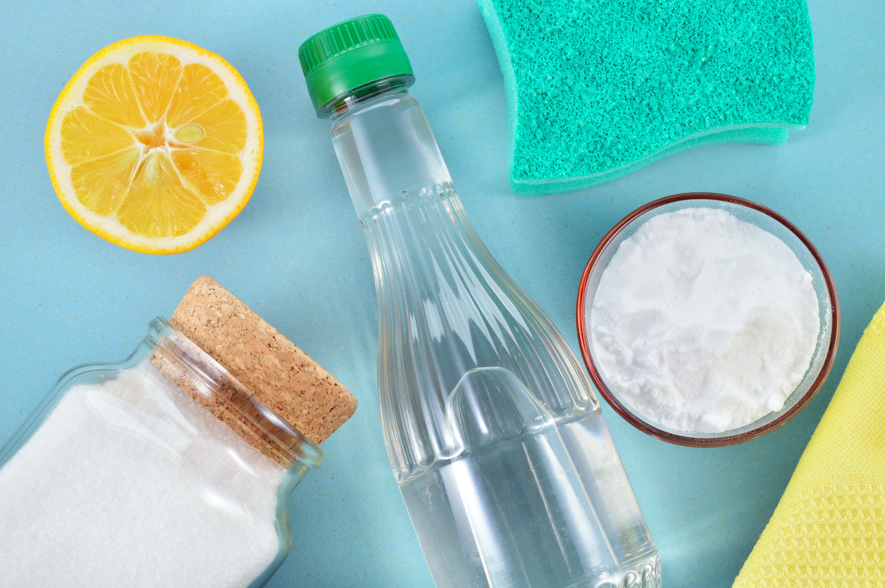 Natural cleaning products in blue background