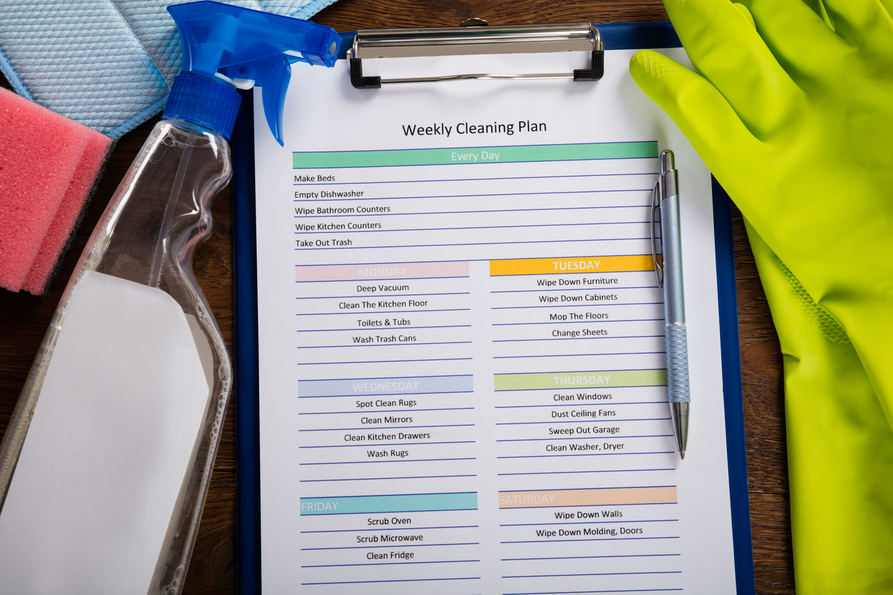 weekly-cleaning-plan-form-with-pen-on-clipboard-organized-concept